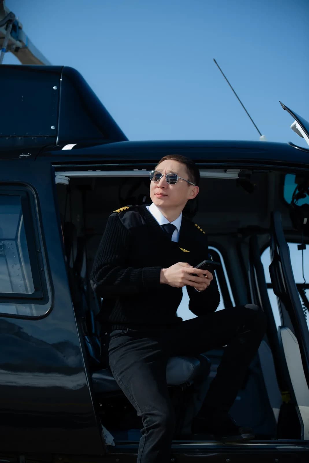 Pilot in the cockpit of an Insurco-insured helicopter