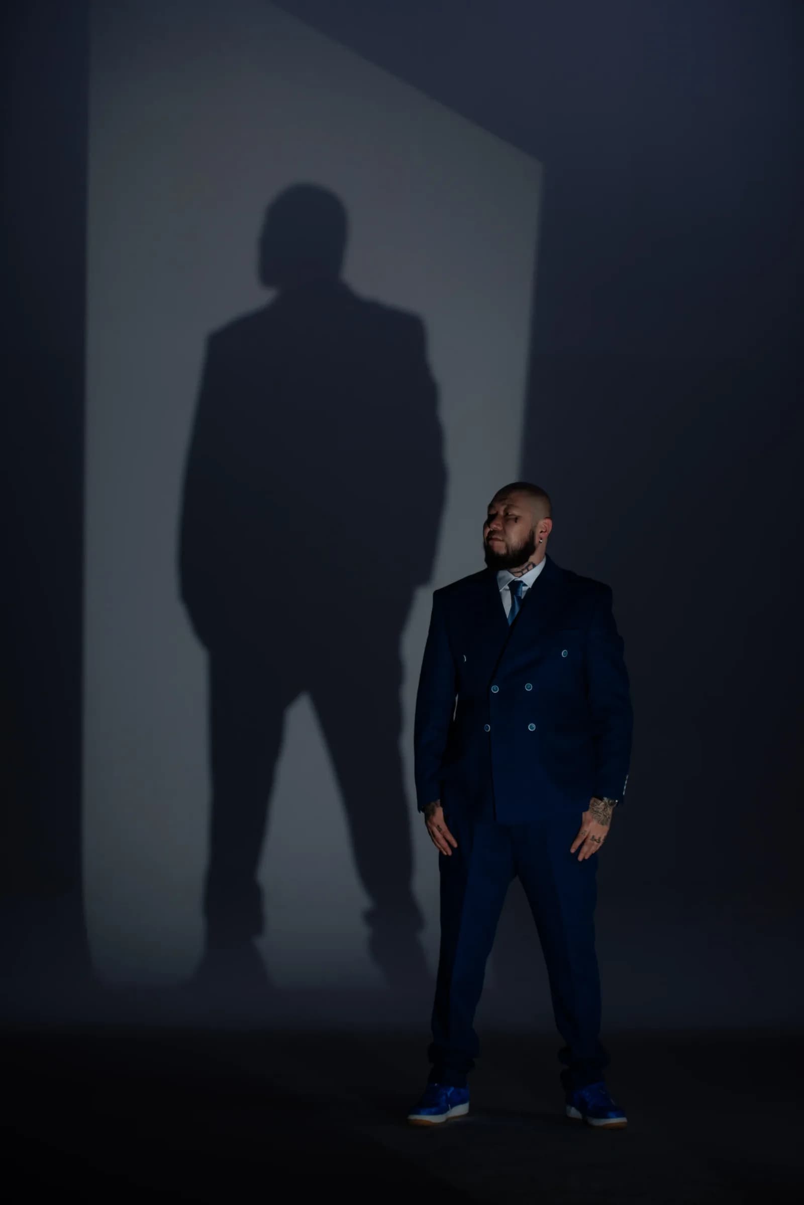 Insurco-suited business borrower with a backlit silhouette